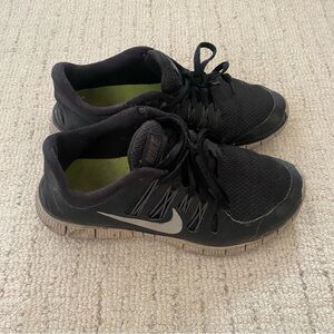 Black Nike work-out shoes
